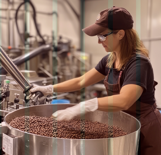A coffee roaster working at a café.