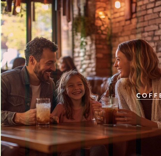 A family enjoying their time at a café.
